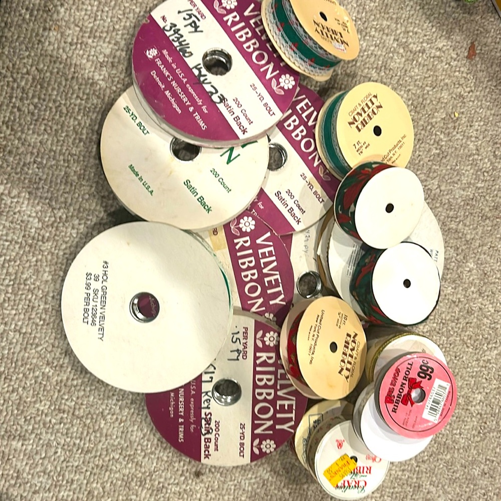 So many ribbons!!! 18 spools of mostly velvety ribbon. Some lace Christmas theme